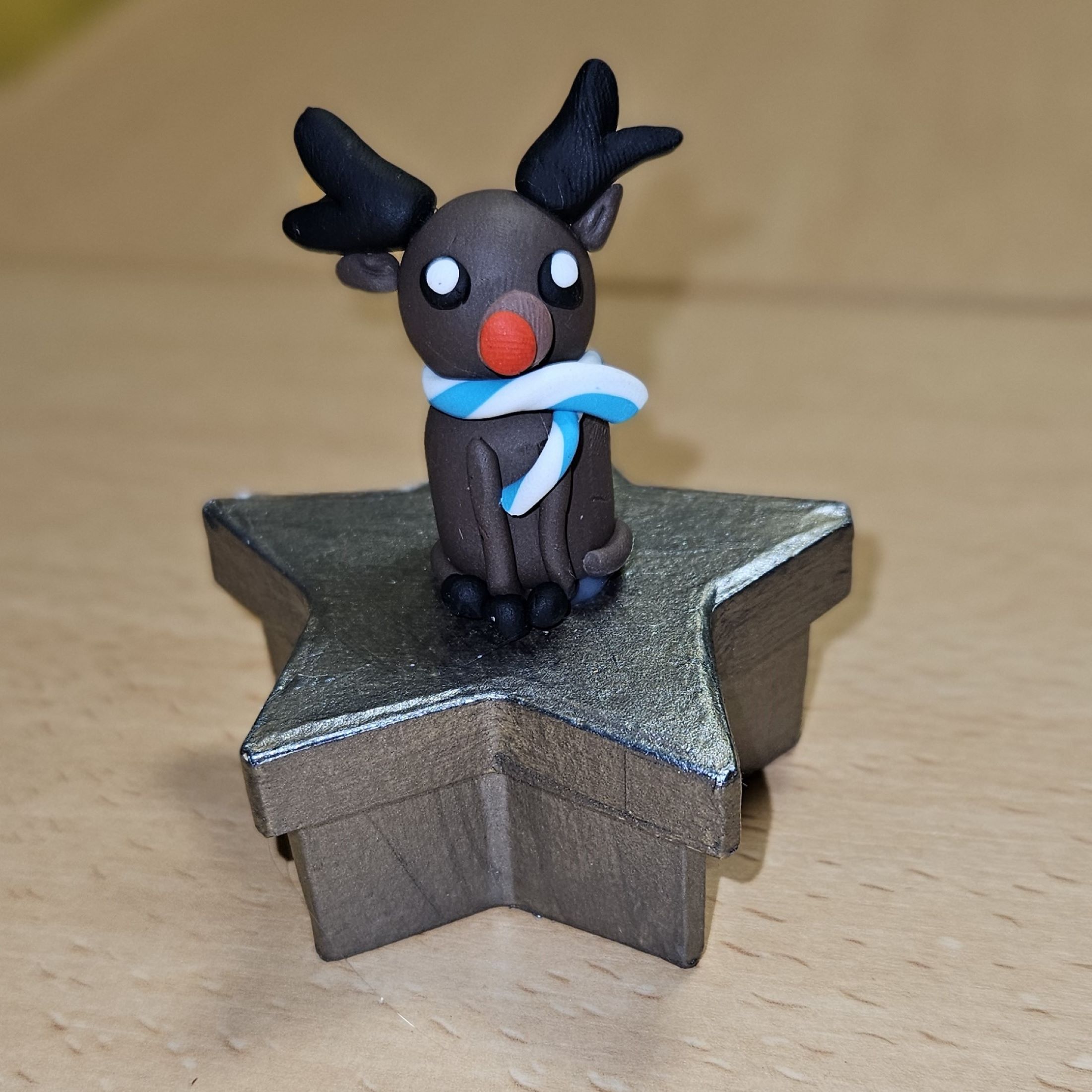 Boite étoile et son petit renne